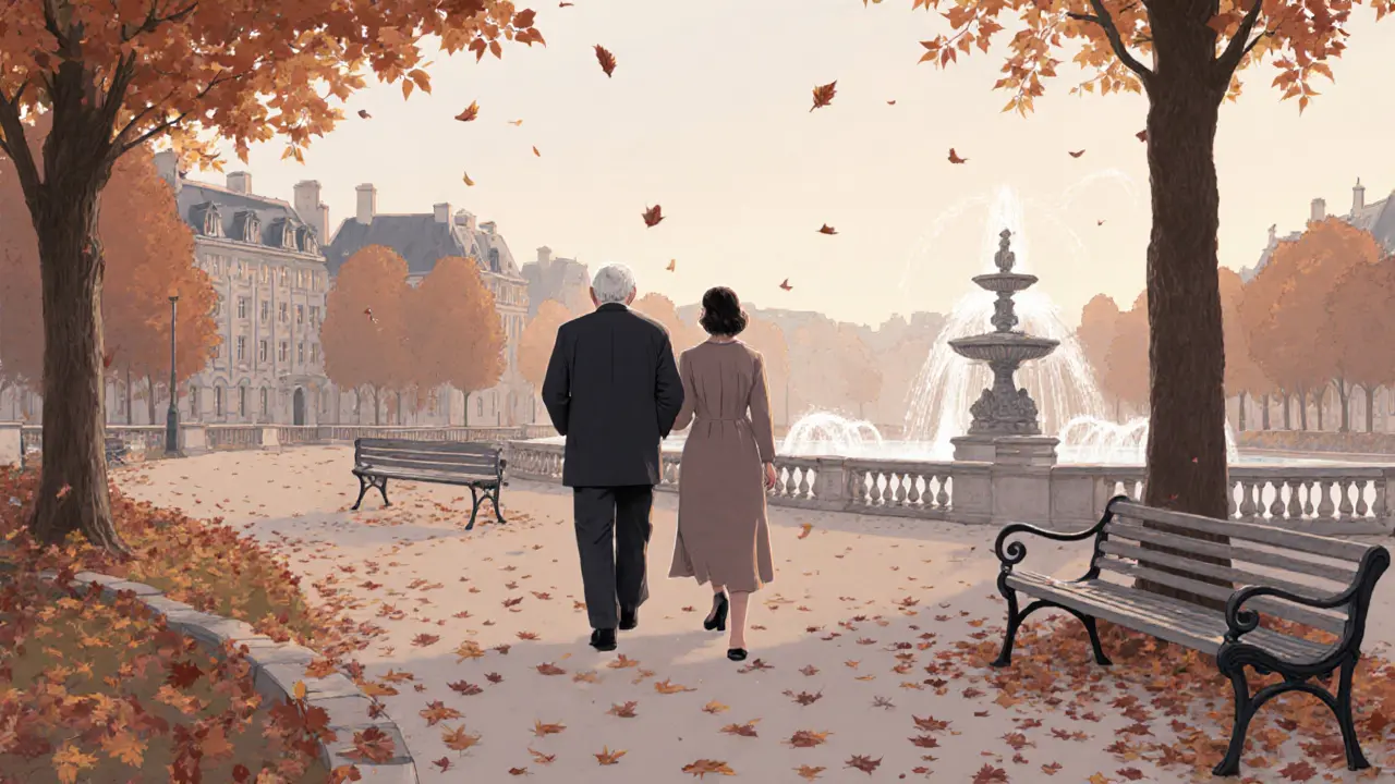 An elderly man and woman walk peacefully through Luxembourg Gardens at dawn, surrounded by falling leaves and quiet beauty.